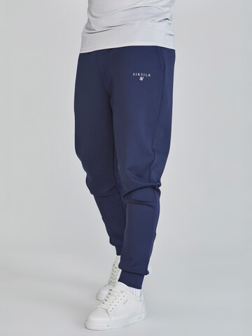Tapered Pantaloni sportivi di SikSilk in blu