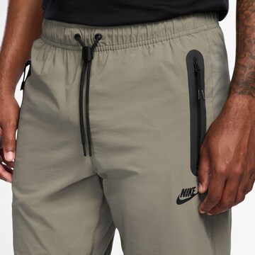 Nike Sportswear Tapered Pants 'Tech' in Green