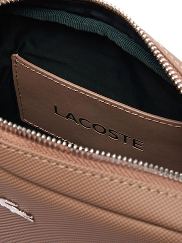 LACOSTE Válltáska - bézs