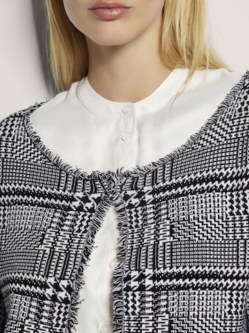 MADELEINE Gebreid vest in Zwart