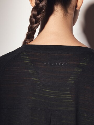 T-shirt Next en noir
