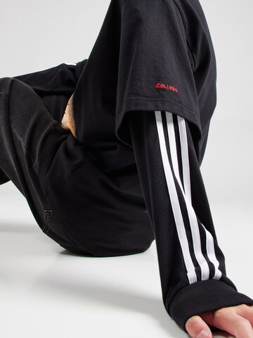 ADIDAS ORIGINALS - Camisa 'Korn' em preto