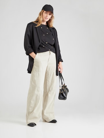 Tricou 'CARKITA' de la ONLY Carmakoma pe negru
