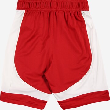 Loosefit Pantaloni sportivi di ADIDAS PERFORMANCE in rosso