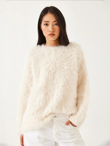 Pull-over oversize Bianco Lucci en beige : devant