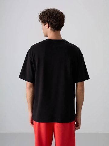 Tommy Life Särk 'T-Shirts', värv must