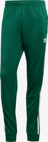 Tapered Pantaloni 'Adicolor Classics Sst' de la ADIDAS ORIGINALS pe verde: față