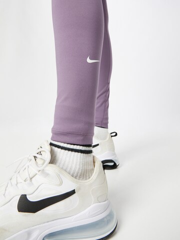 NIKE Skinny Workout Pants in Purple