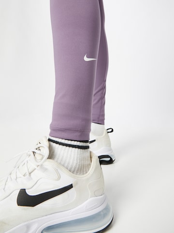 NIKE Skinny Sports trousers in Purple