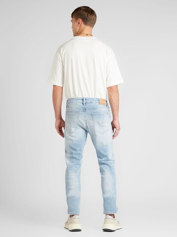 zils Tommy Jeans Piegulošs Džinsi 'AUSTIN SLIM TAPERED'