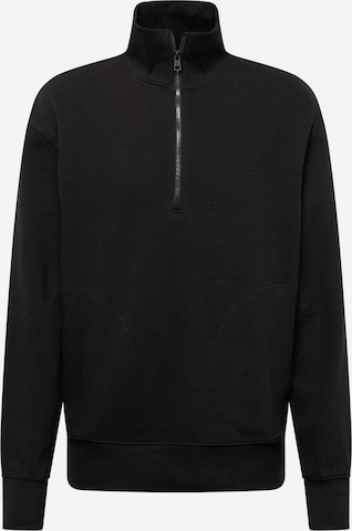 Sweat-shirt Calvin Klein Jeans en noir : devant