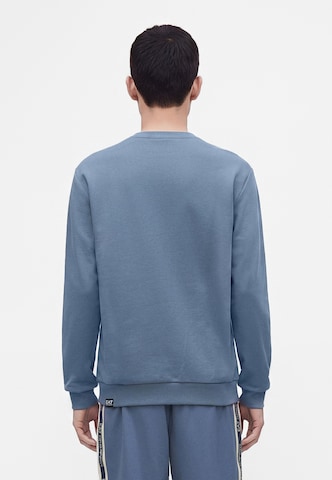 EA7 Emporio Armani Sweatshirt 'TRAIN LOGO SERIES' i blå: baksida