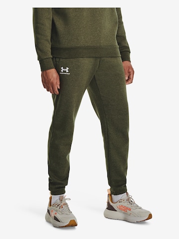 UNDER ARMOUR Tapered Sports trousers 'Essential' in Green: front