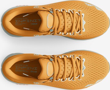 UNDER ARMOUR Loopschoen 'Infinite 4' in Oranje