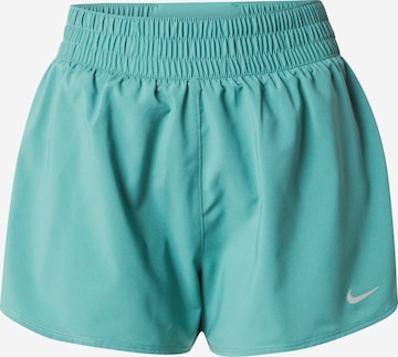 Regular Pantaloni sport 'ONE' de la NIKE pe verde: față