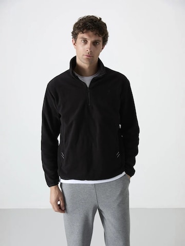 Tommy Life Fleece jas in Zwart: voorkant