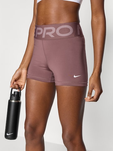 NIKE Skinny Παντελόνι φόρμας σε λιλά