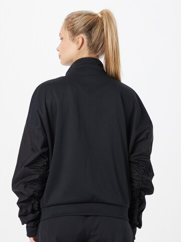 Reebok Sportsweatjacke in Schwarz