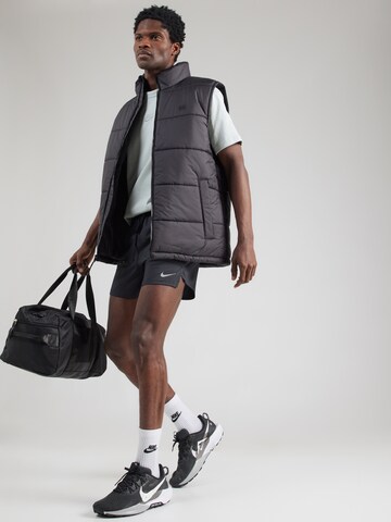 NIKE Regular Workout Pants 'STRIDE ENERGY' in Black