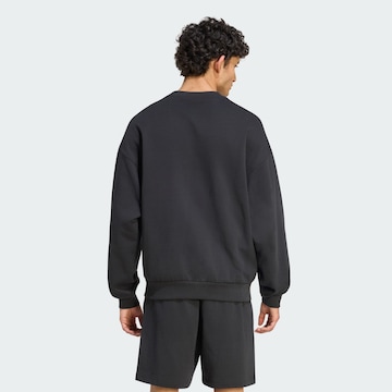 ADIDAS SPORTSWEAR - Camiseta deportiva en negro