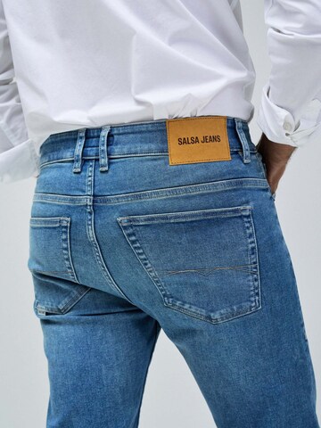 Coupe slim Jean Salsa Jeans en bleu