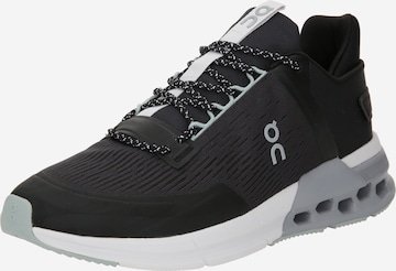 On Running shoe 'Cloudnova Flux' in Black: front