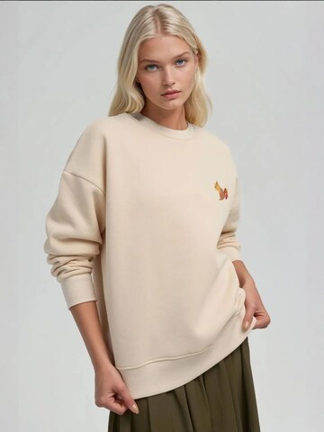 Sweat-shirt Hiccup en beige : devant