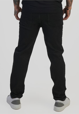 Coupe slim Jean SikSilk en noir