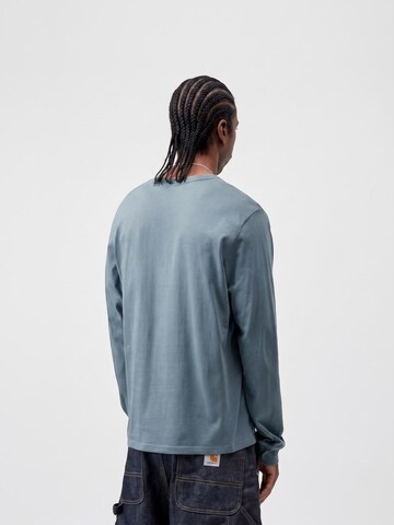 Carhartt WIP Koszulka 'L/S POCKET T-SHIRT VELVET BLUE' w kolorze niebieski