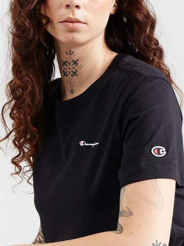 Maglietta di Champion Authentic Athletic Apparel in nero