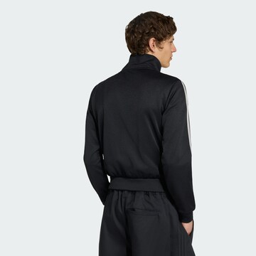 ADIDAS ORIGINALS - Casaco em moletão 'Beckenbauer' em preto