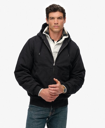 Superdry Tussenjas 'Surplus' in Zwart: voorkant