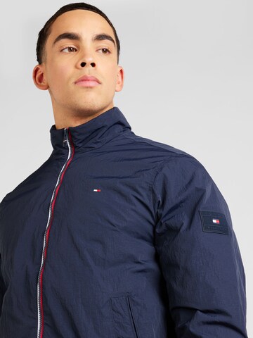 TOMMY HILFIGER Tussenjas in Blauw