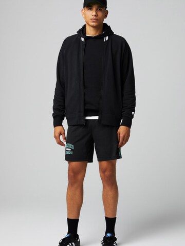Sweat-shirt Fabletics en noir