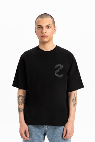 T-Shirt UNIQVIBE en noir : devant