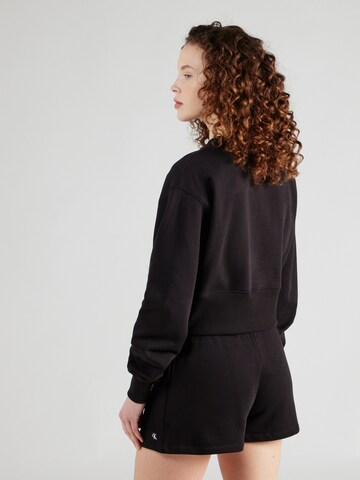 Sweat-shirt 'INSTITUTIONAL' Calvin Klein Jeans en noir