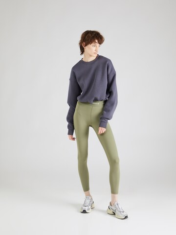 new balance Skinny Sports trousers 'Sleek 25' in Green