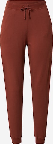 Effilé Pantalon de sport NIKE en marron : devant