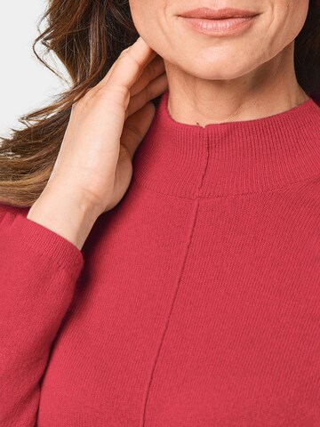 Goldner Pullover in Rot