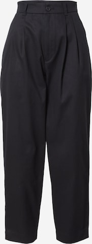 MELAWEAR Tapered Pleat-Front Pants 'NEHA' in Black: front