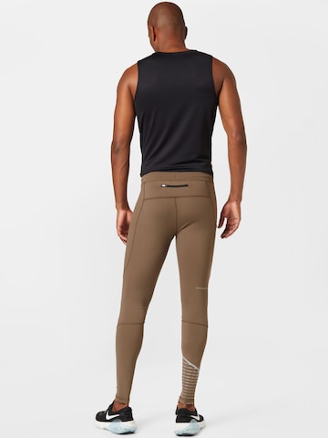 Skinny Pantaloni sportivi 'CHICAGO' di Newline in verde