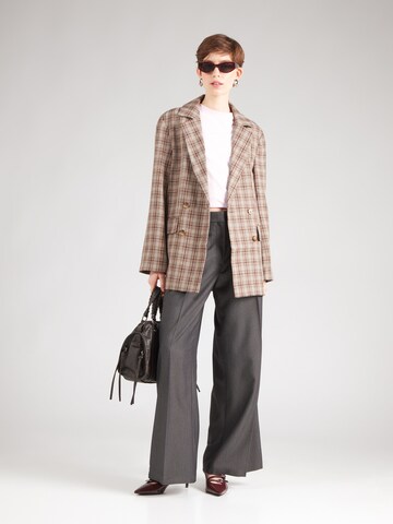 Wide leg Pantaloni con pieghe di Monki in grigio