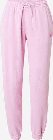 Effilé Pantalon de sport Reebok en rose : devant