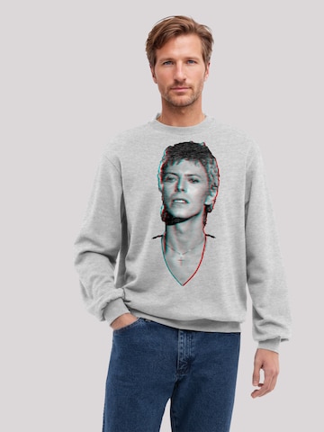 Sweat-shirt 'TV Times Pop Star David Bowie Portrait 1977' F4NT4STIC en gris : devant