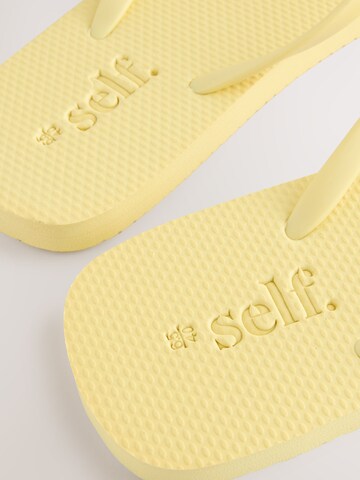 Tongs Next en jaune