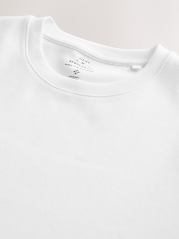 T-Shirt Next en blanc