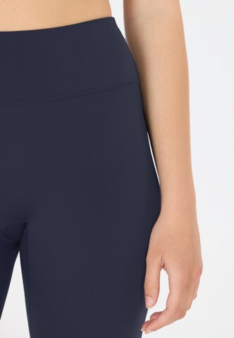 Athlecia Skinny Tights 'Blossom' in Blau
