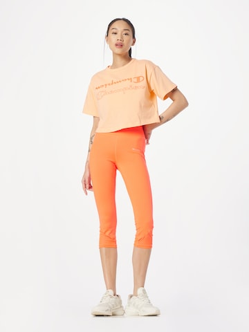 Champion Authentic Athletic Apparel Skinny Workout Pants in Orange