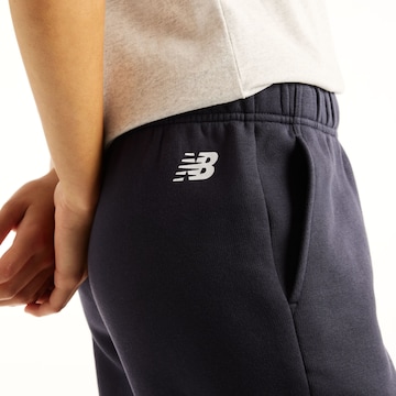 new balance - Flared Calças 'Reimagined Fleece Pant' em preto