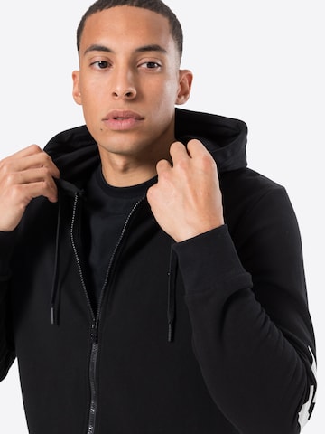 Hummel Sports sweat jacket 'Legacy' in Black